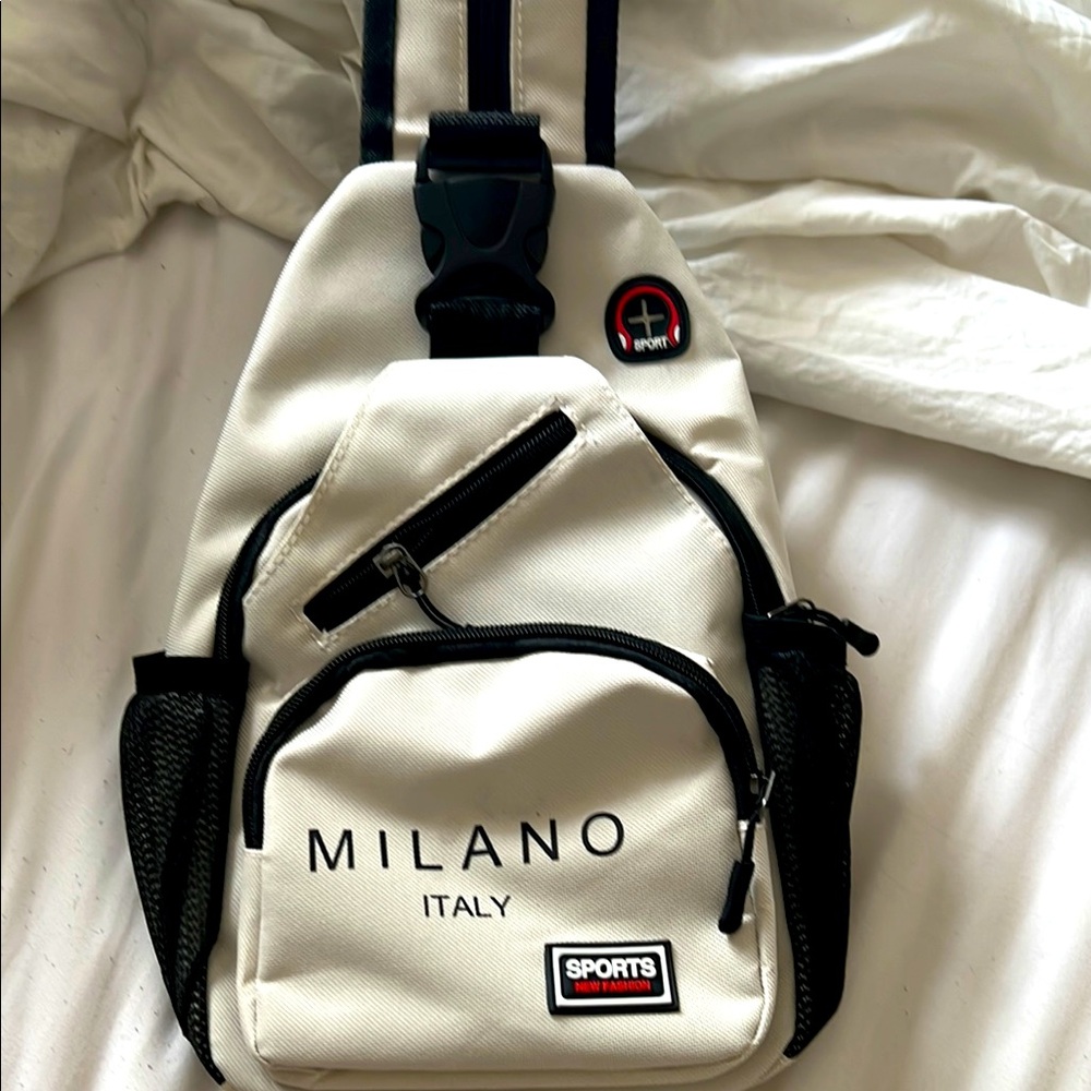 White and Black Sports Back Pack 13”x9”